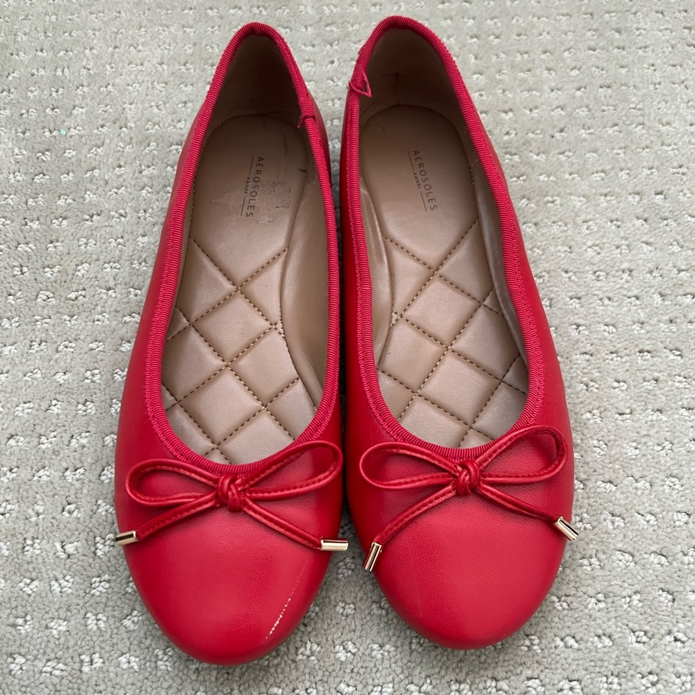 Gently worn girl’s red flats size 5.5
